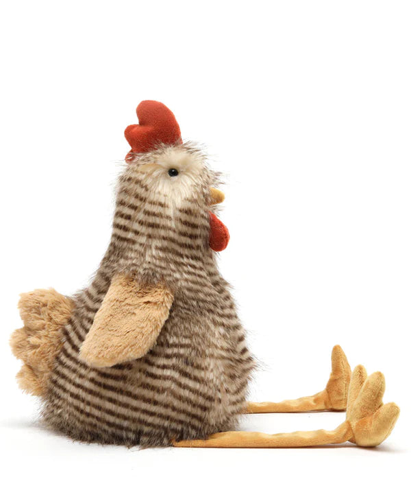 a side view of rupert the rooster soft toy