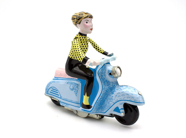 tin toys collector girl ona. vespa in blue 