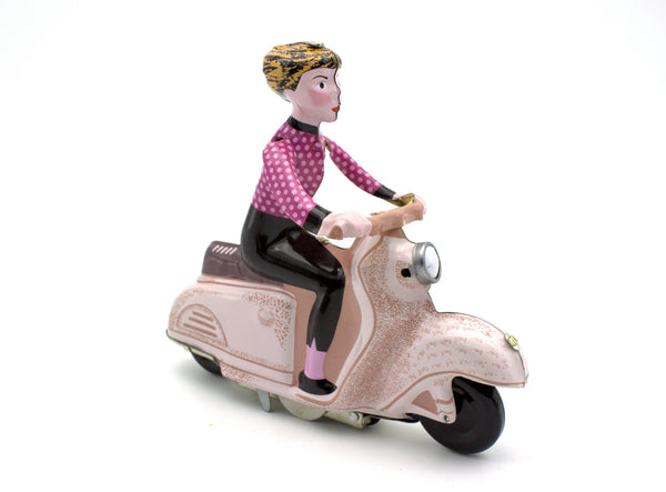 vespa collectable tin toy wind up girl on a vespa in pink