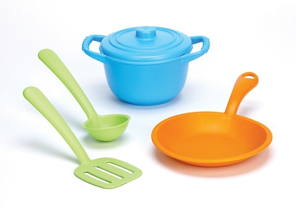 green toys chef set with two green utensils, a blue crock pot and an orange frying pan