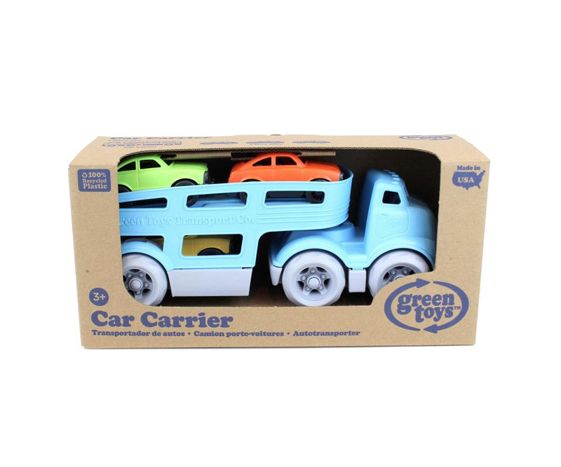 a green toys blue tow truck