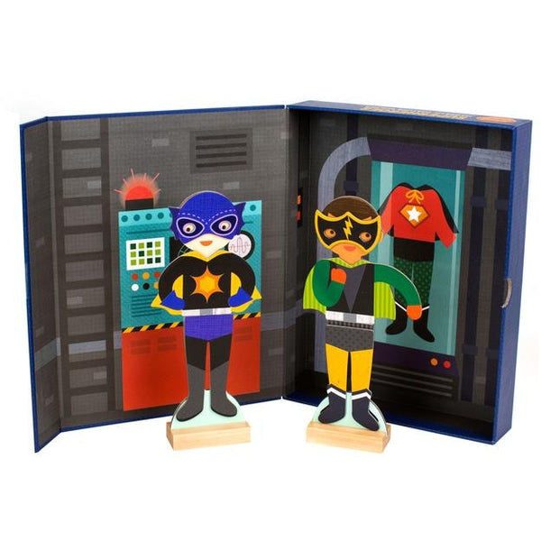 Help these friends get ready for a Superhero day. Choose their outfits and accessories with this hero packed magnetic dress-up set. Includes two magnetic figures, two wooden stands, 27 magnetic pieces and a secret hideout. Create over 80 outfits.