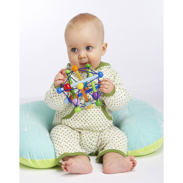 Manhattan skwish wooden teether is a multi sensory toy for ages newborn and up.  Colourful, textured and flexible for babies to enjoy.