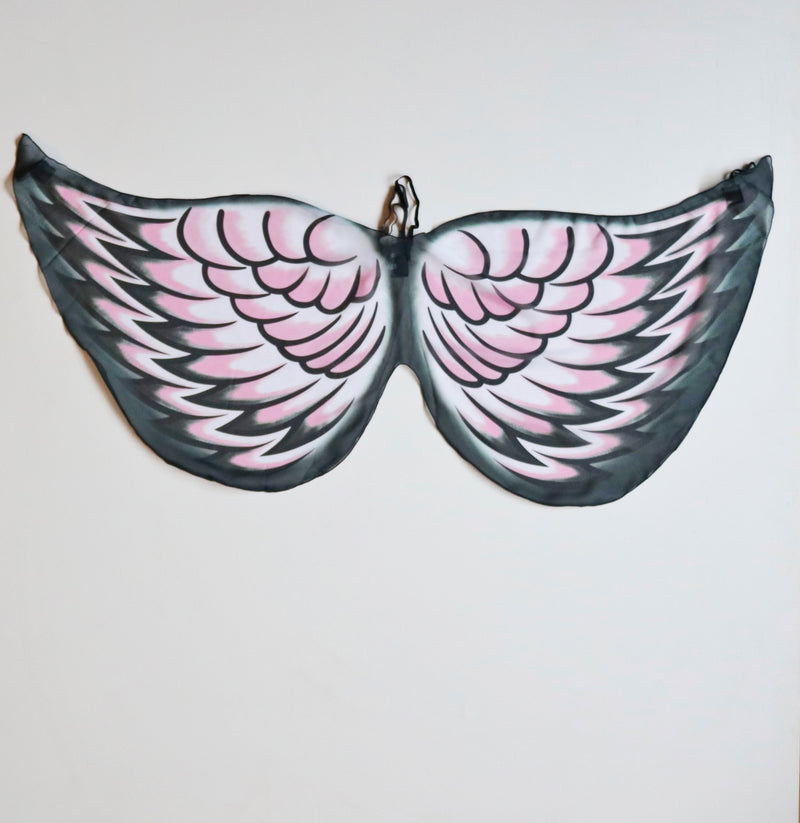 Beautiful galah bird wings for children with amazing colors of black, pink and white.