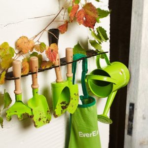 everearth wooden garden tool set 3 pieces green good for child mobility toys on a rack