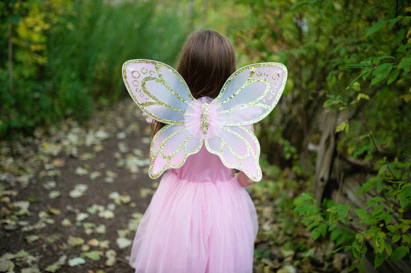 a girls butterfly costume in pink and gold with glittery wings