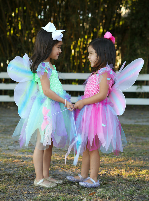 great pretenders fairy girls costumers in pink and green
