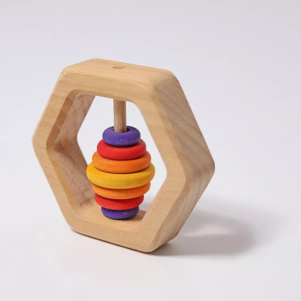 grimms hexagonal rattle with coloured rings
