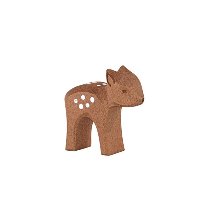 a small wooden deer figure in brown stained wood with white hand painted spots on its back by ostheimer wooden toys