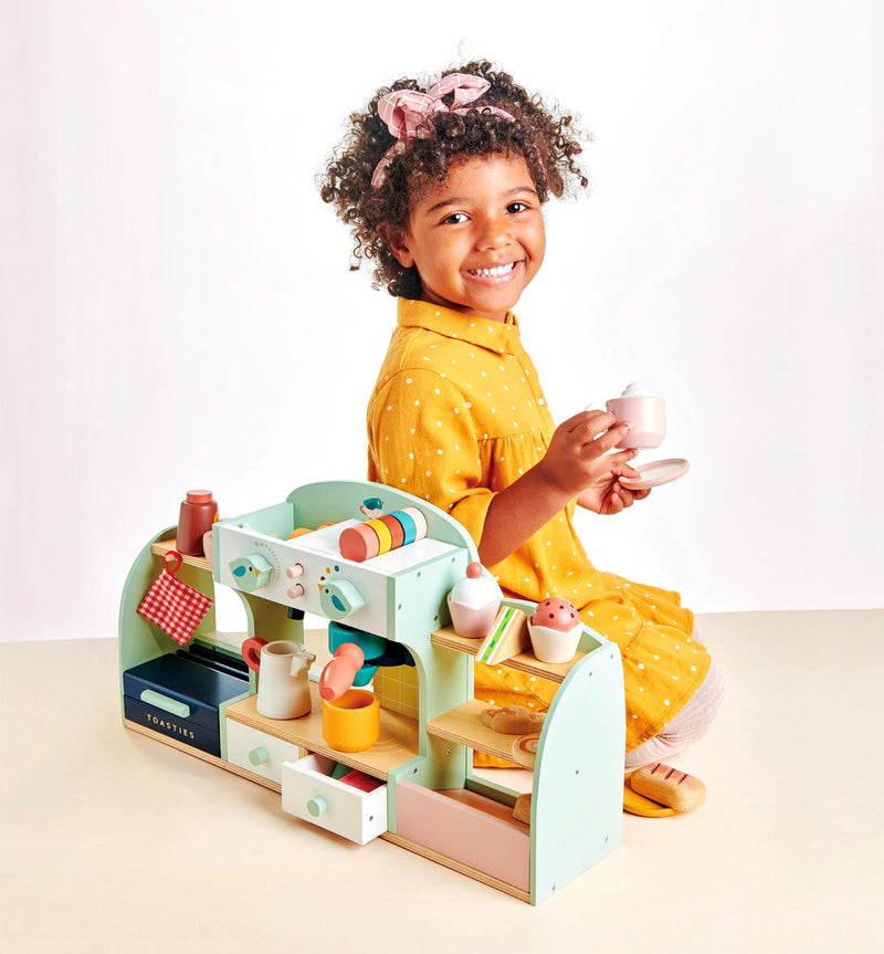 Tender Leaf Toys mini cafe is a wonderful new wooden imaginative play set for ages 3+. Make coffee, tea and serve cake for morning tea. Enjoy hours of cafe play. 