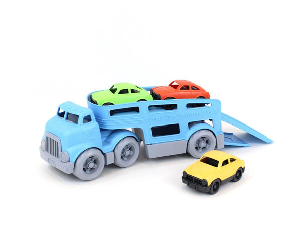 green toys car carrier or tow truck with three coloured cars