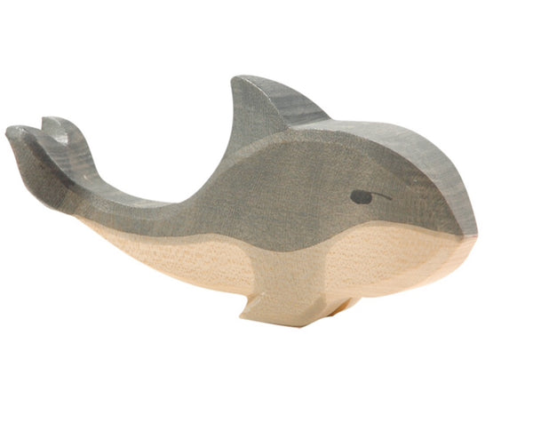 an ostheimer hand carved wooden whale resembling an orca