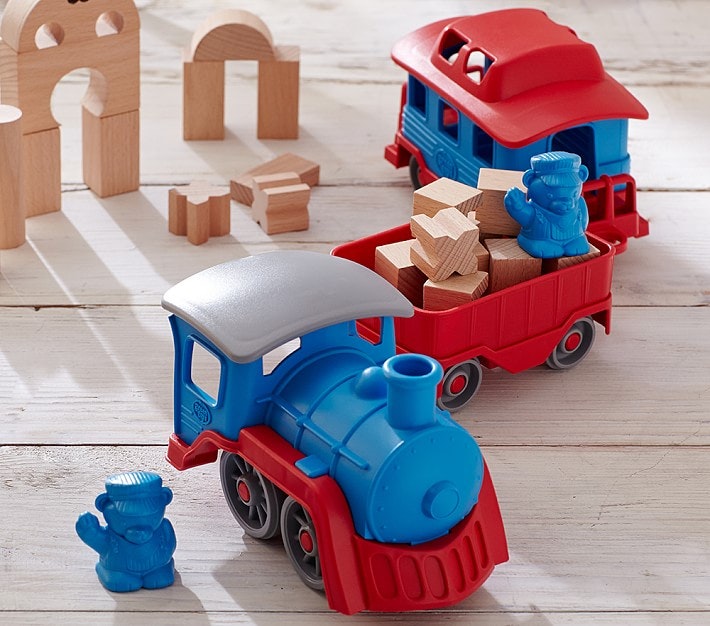 the green toys three piece train set filled up with wooden blocks