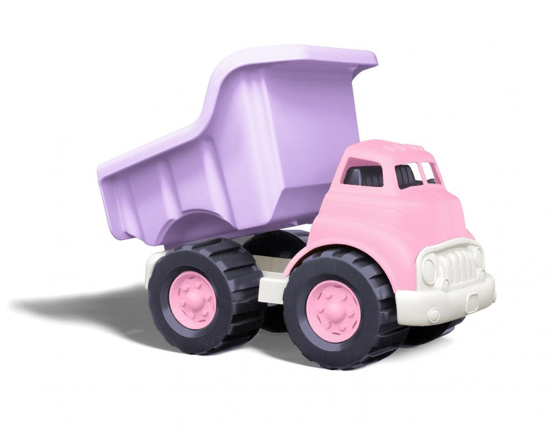 green toys pink dump truck with a pink cabin and hub caps
